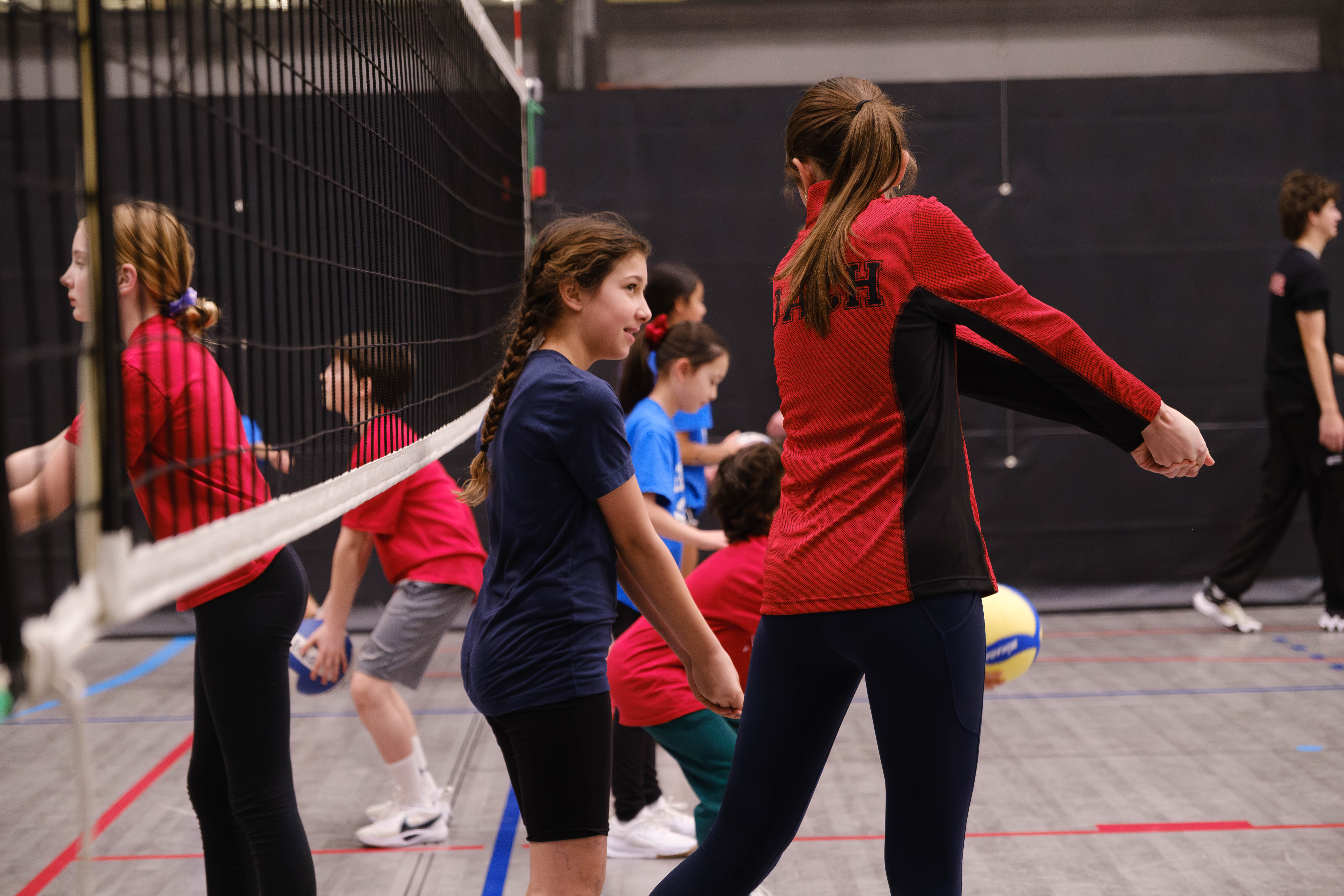 Stryker Volleyball athlete executing a play on court